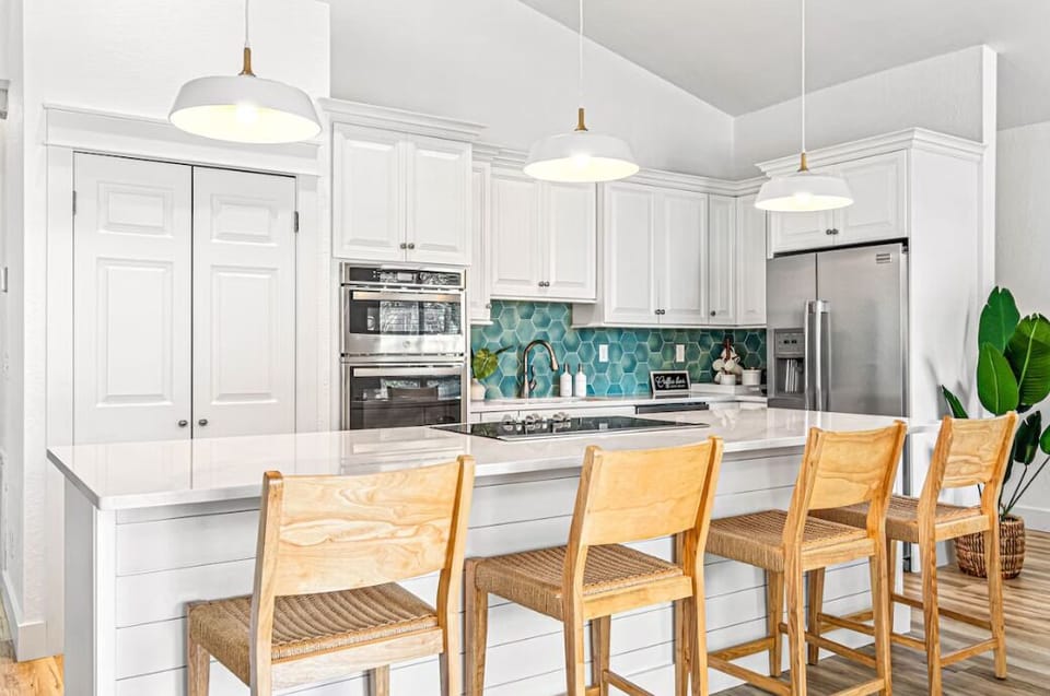 Kitchen with additional breakfast bar seating.