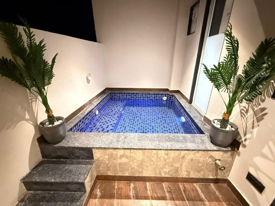 Luxury Double Room | Pool | 2 outdoor pools, open 8:00 AM to 8:00 PM, pool umbrellas, sun loungers