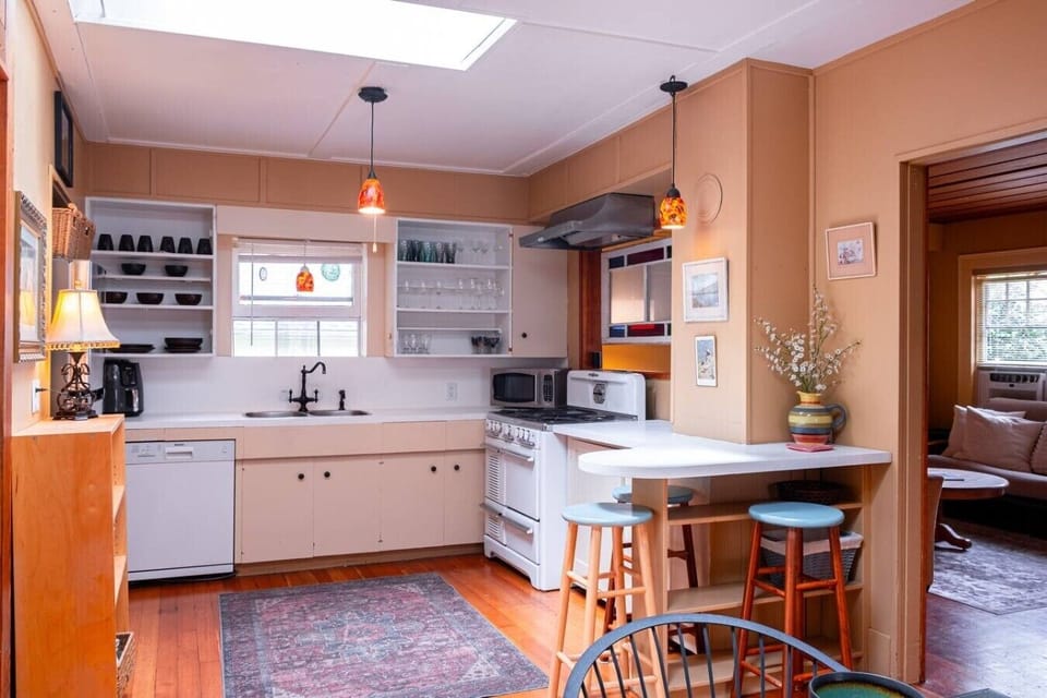 Full kitchen with gas cooktop and vintage charm