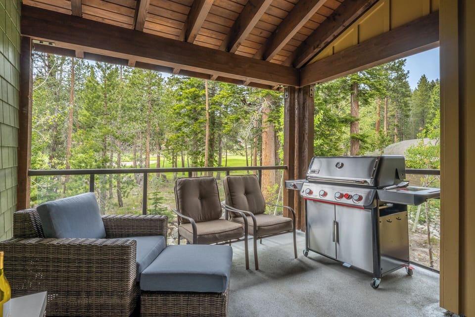 Imagine grilling your favorite meals on your private covered deck, surrounded by towering pines and peaceful forest views—your perfect mountain retreat awaits.