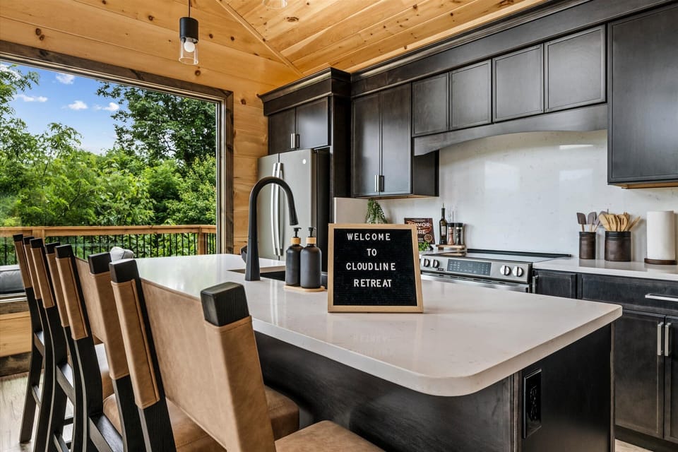 Morning coffee at the island, mountains through the glass — welcome to CloudLine.