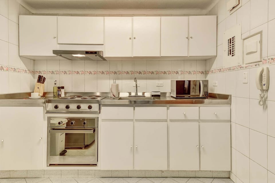 Practical kitchen equipped with everything you need for cooking, dining, and everyday convenience.