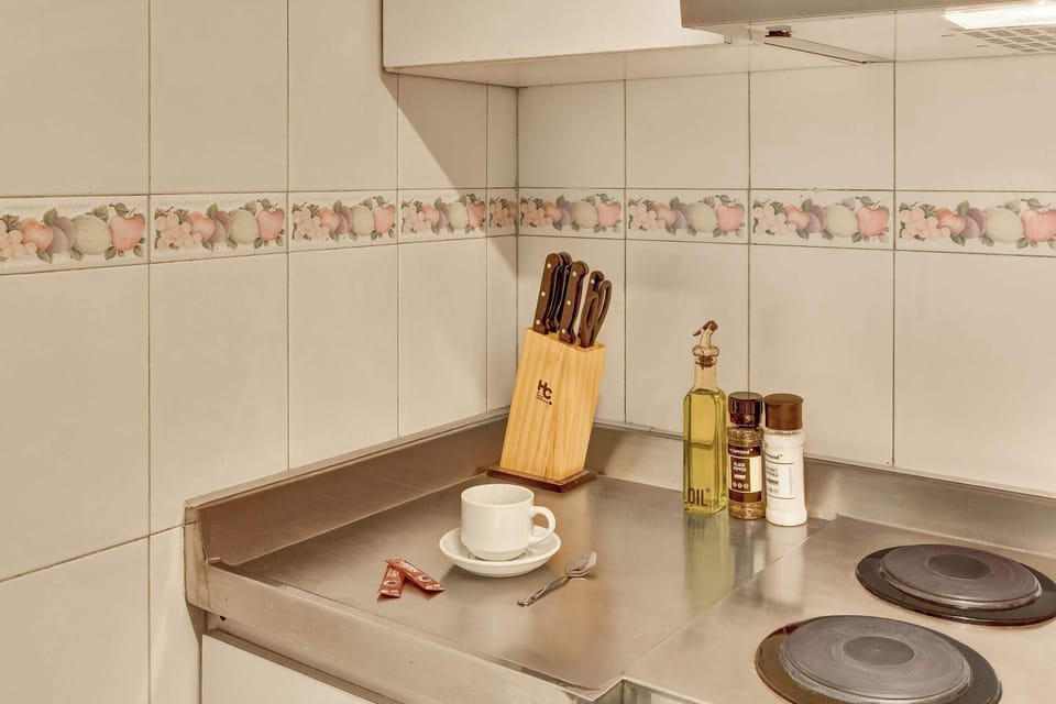 Spacious countertops provide plenty of room for meal preparation and morning coffee routines.