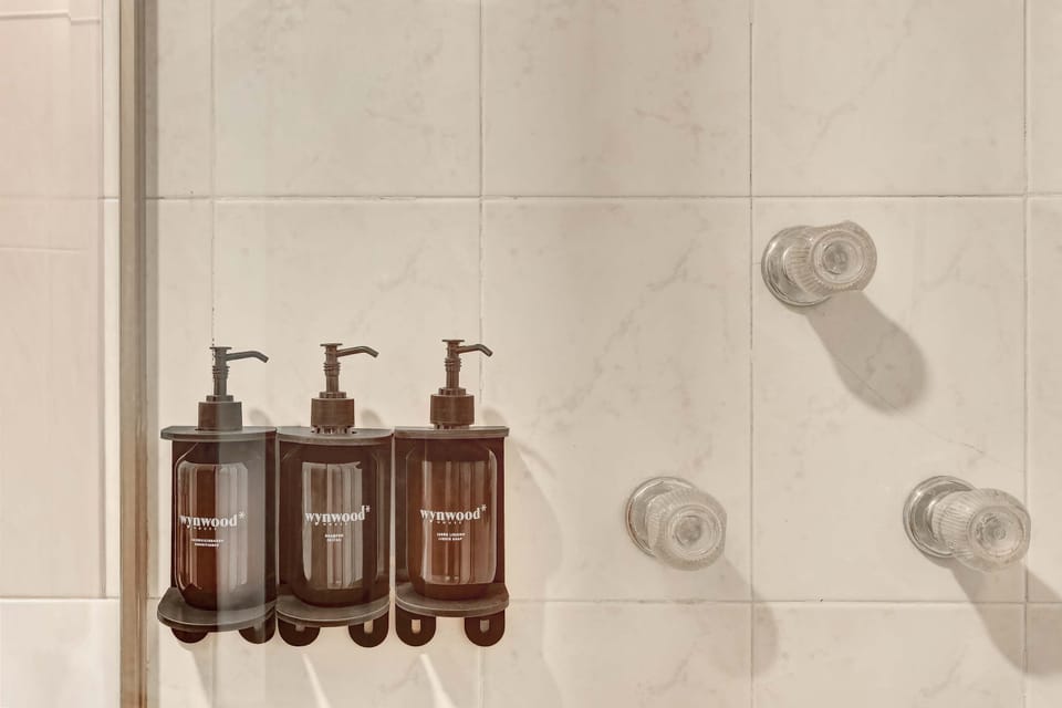 Enjoy a refreshing shower experience with complimentary toiletries and clean, modern finishes.