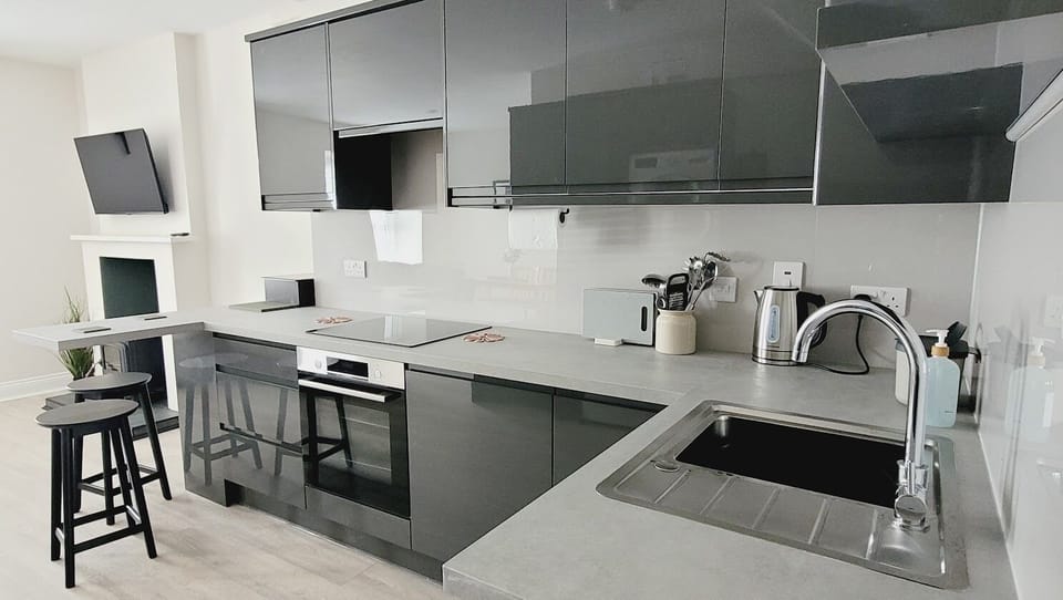 Openplan kitchen with breakfast bar and smart layout for easy dining and cooking