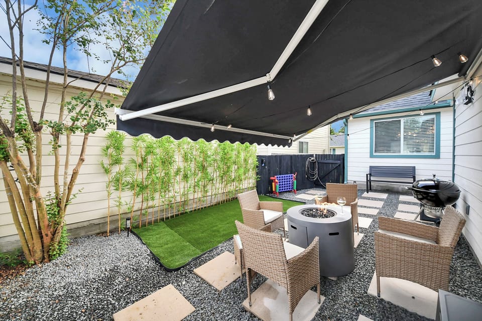 Shade, style, and total privacy. Escape to a backyard built for ultimate relaxation. This fully fenced retreat offers: Secluded vibes, All Weather Comfort, Lawn & Games, BBQ Ready!