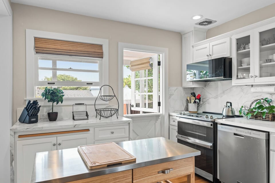 Enjoy a bright and inviting kitchen with modern appliances, plenty of counter space, and all the essentials for preparing meals during your stay.