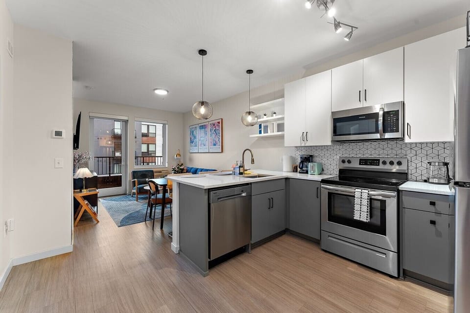 Fully equipped kitchen with stainless steel appliances, modern finishes, and everything needed for a comfortable stay.