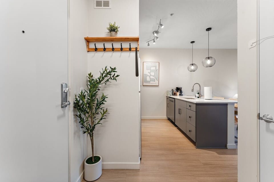 Welcoming entryway with easy access to the kitchen and open living space, creating a bright and inviting arrival.