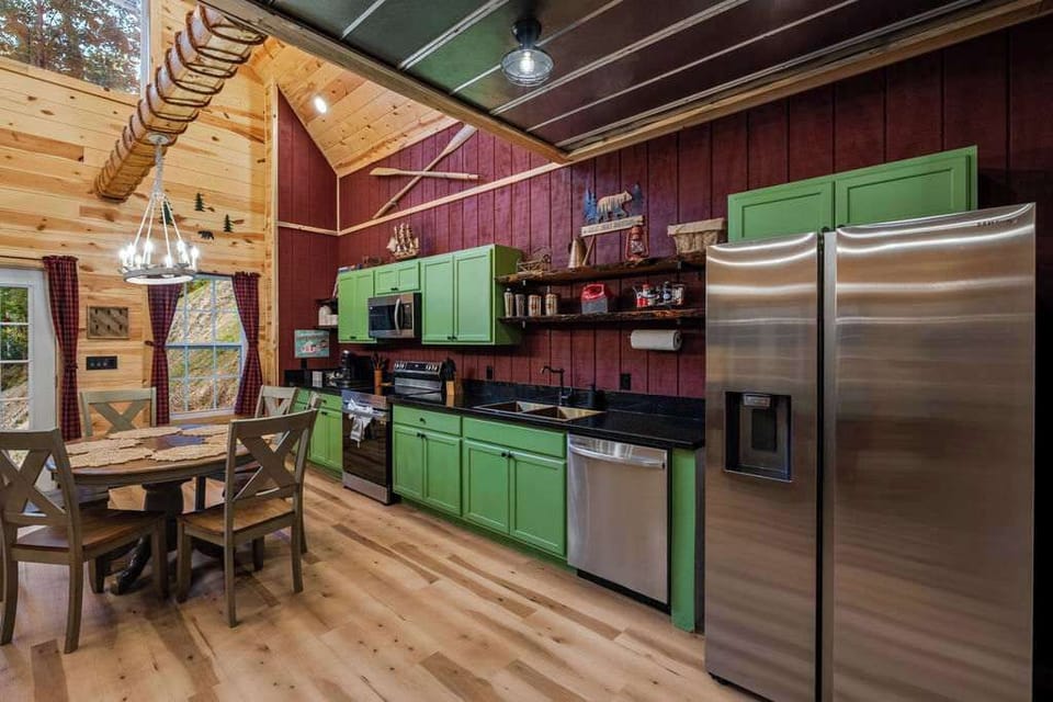 Rustic Kitchen with Stainless Steel Appliances. . 