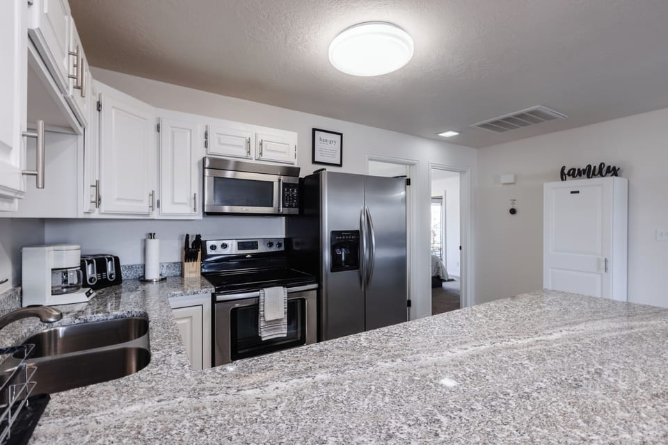 The kitchen comes fully stocked and ready to make any meal!