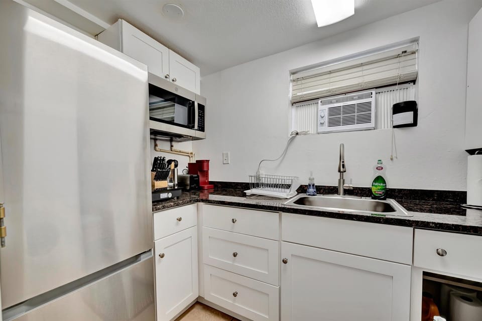 Basic Studio, 1 Double Bed, Patio | Private kitchen | Coffee/tea maker, full-size fridge, toaster, cookware/dishes/utensils