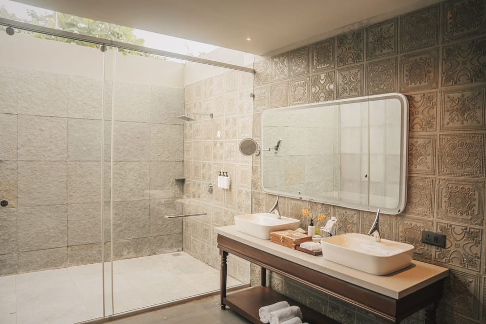 Dviya | Bathroom | Free toiletries, hair dryer, bathrobes, slippers