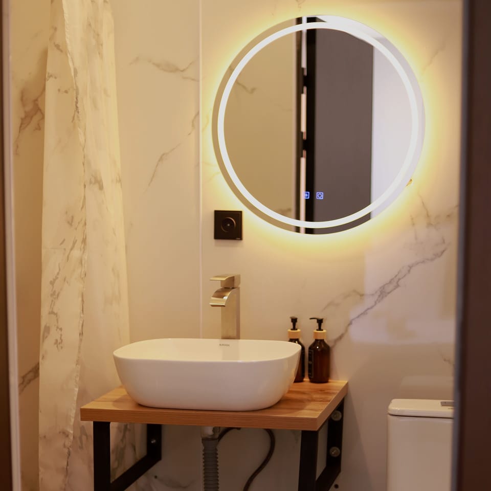 Superior Double Room, Courtyard View | Bathroom | Shower, hair dryer, slippers, towels