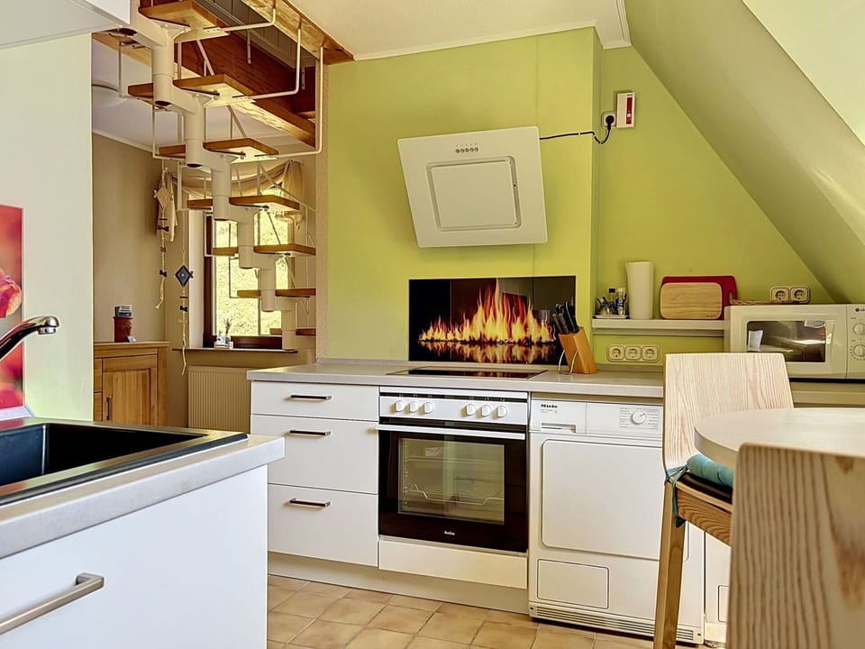 Furniture, Interior Design, Flooring, Wood, Floor, Kitchen Appliance, Kitchen, Home Appliance, Room, Lighting