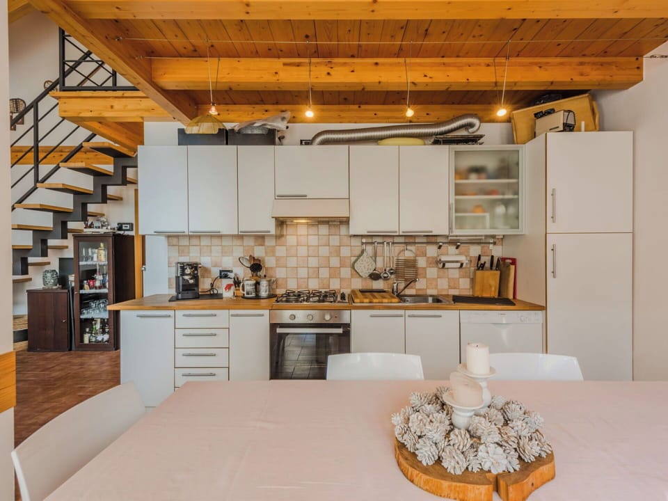 Kitchen, Furniture, Interior Design, Flooring, Countertop, Kitchen Appliance, Floor, Wood, Major Appliance, Ceiling