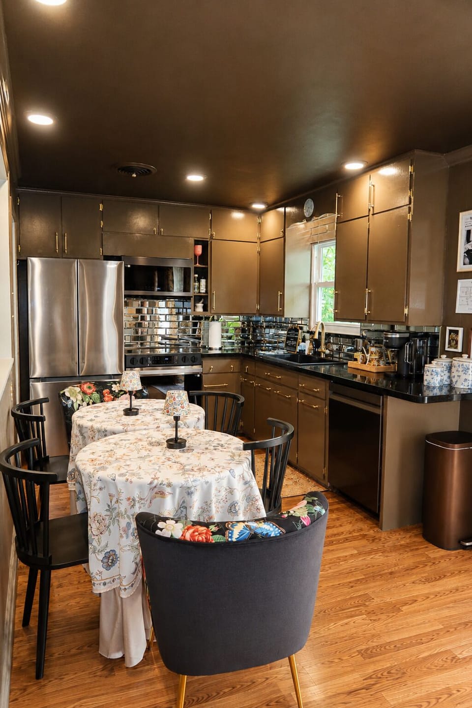 Chic full kitchen with stainless appliances and cozy dining space