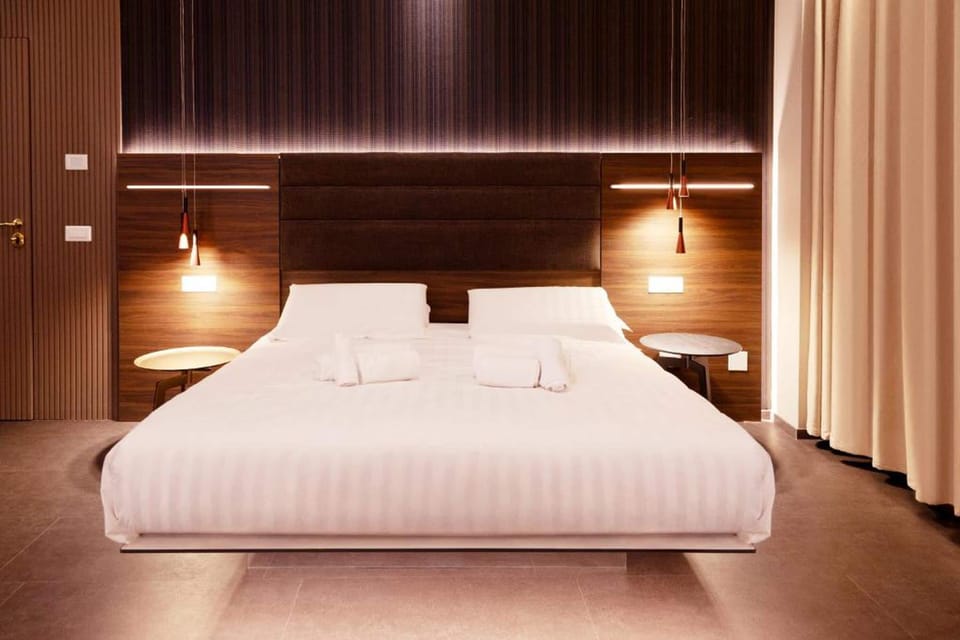 Superior Double Room, Balcony | Minibar, in-room safe, desk, laptop workspace