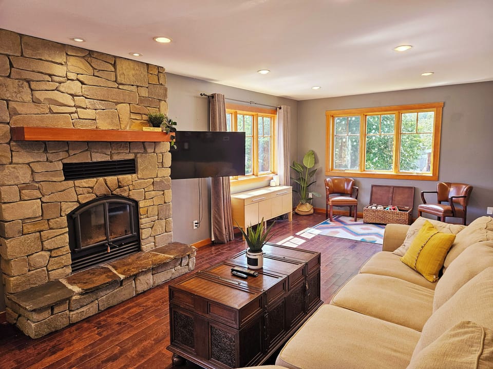 Spacious Living Room | Decorative Fireplace | Smart TV