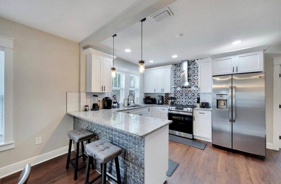 Modern kitchen with barstool seating