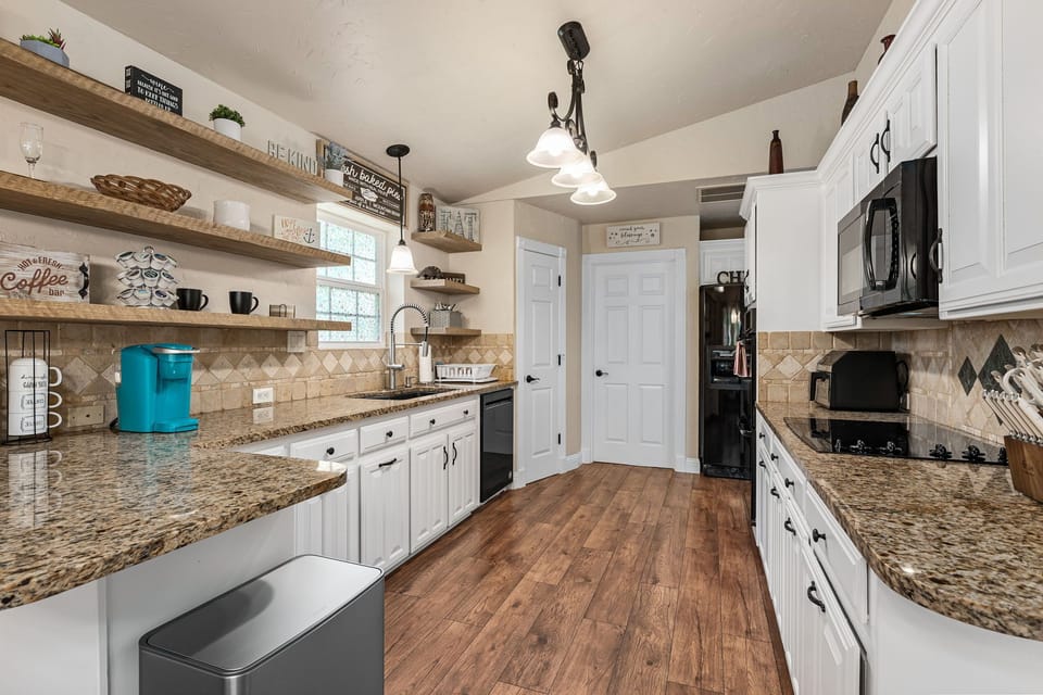 Kitchen built for daily use.  Sharp cutlery, Double oven, Air Fryer, Microwave