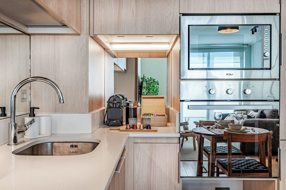 Superior Apartment | Private kitchen | Espresso maker, toaster, highchair, freezer