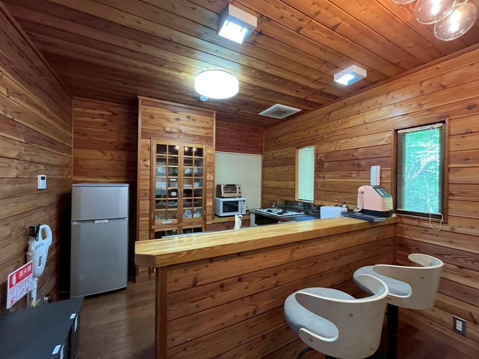 Apartment | Private kitchen | Fridge, microwave, stovetop, cookware/dishes/utensils