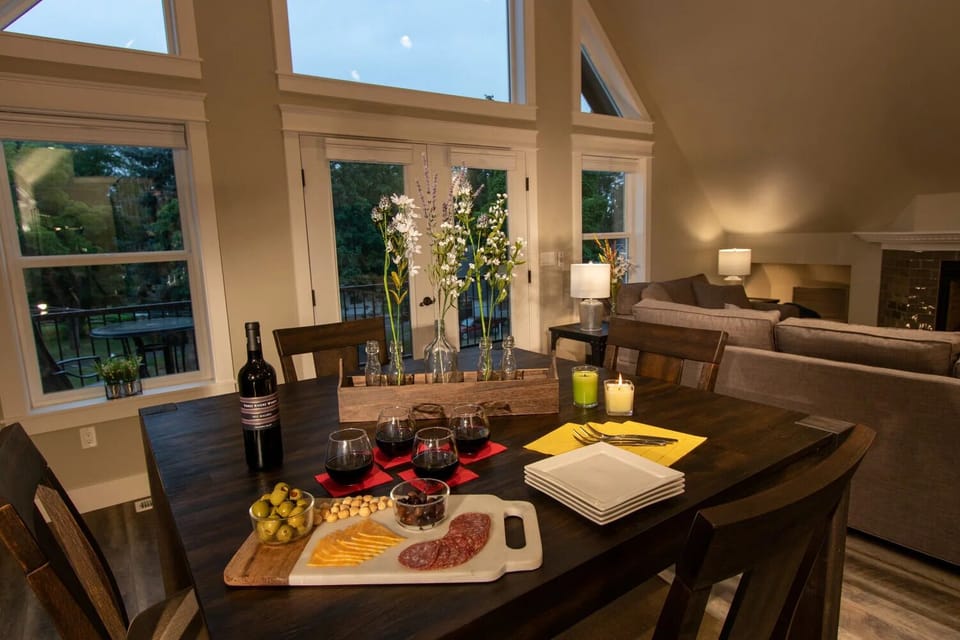 Gather around the dining table for meals, games, and conversation.
