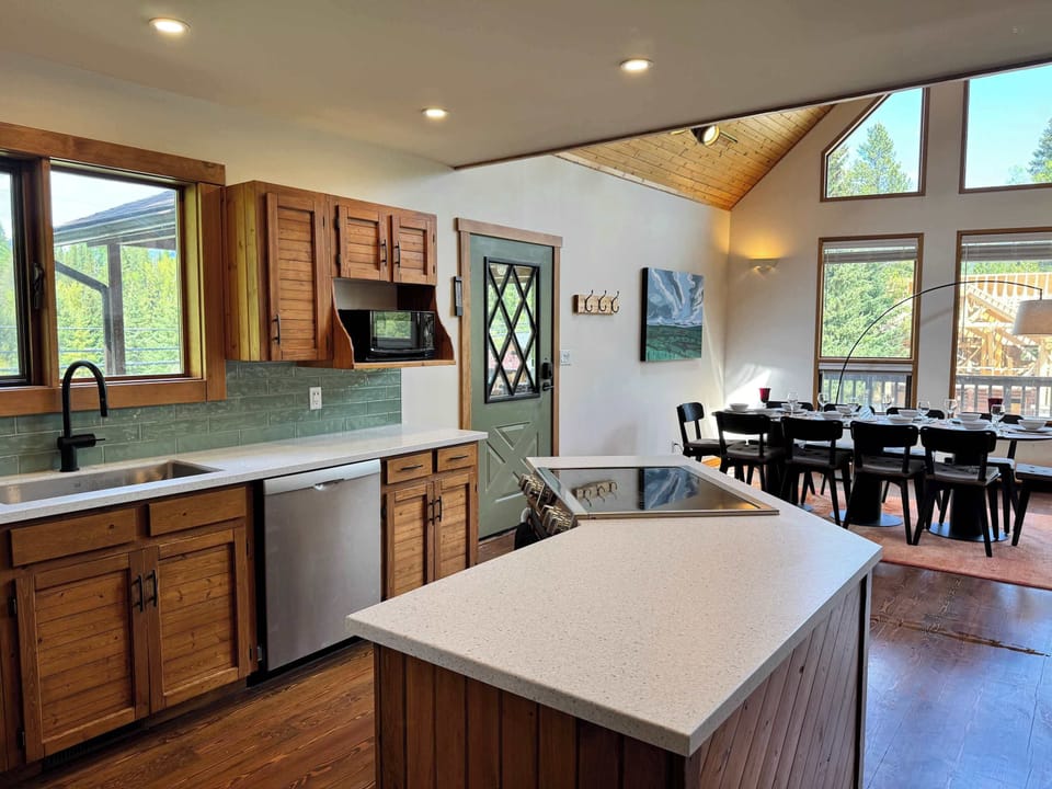 The open kitchen keeps everyone connected.