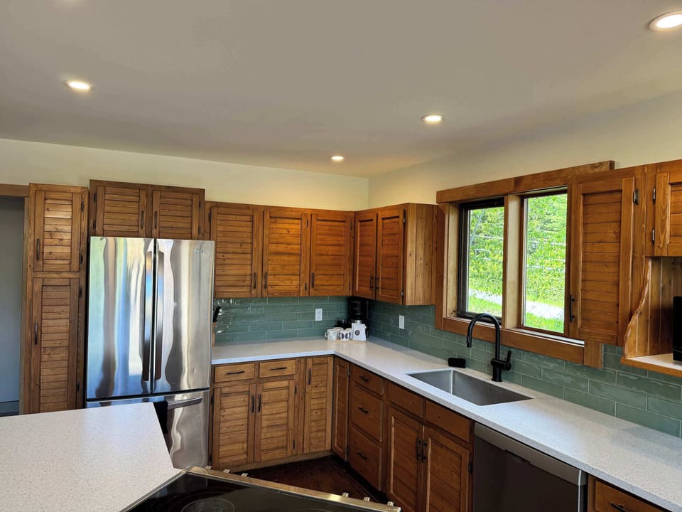 The open kitchen makes cooking and gathering easy.