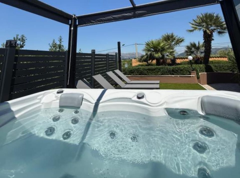 House (Two Bedroom Holiday Home with Hot-Tub) | Private spa tub