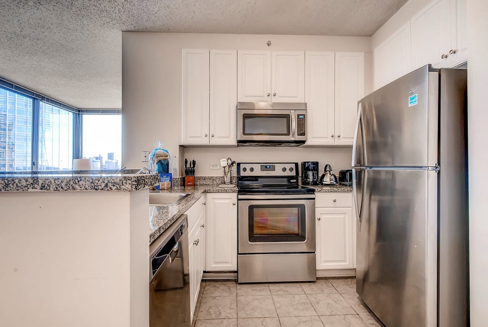 Luxury Apartment, 1 Bedroom | Private kitchen | Full-size fridge, microwave, oven, stovetop