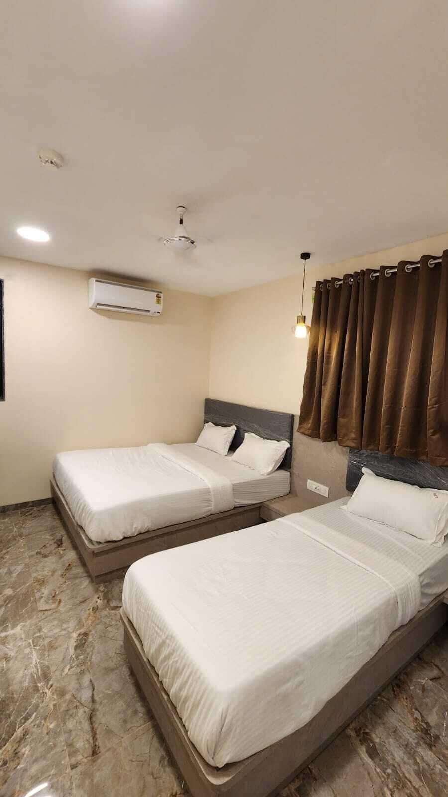 Deluxe Triple Room, Garden View | Desk, laptop workspace, soundproofing, iron/ironing board (on request)