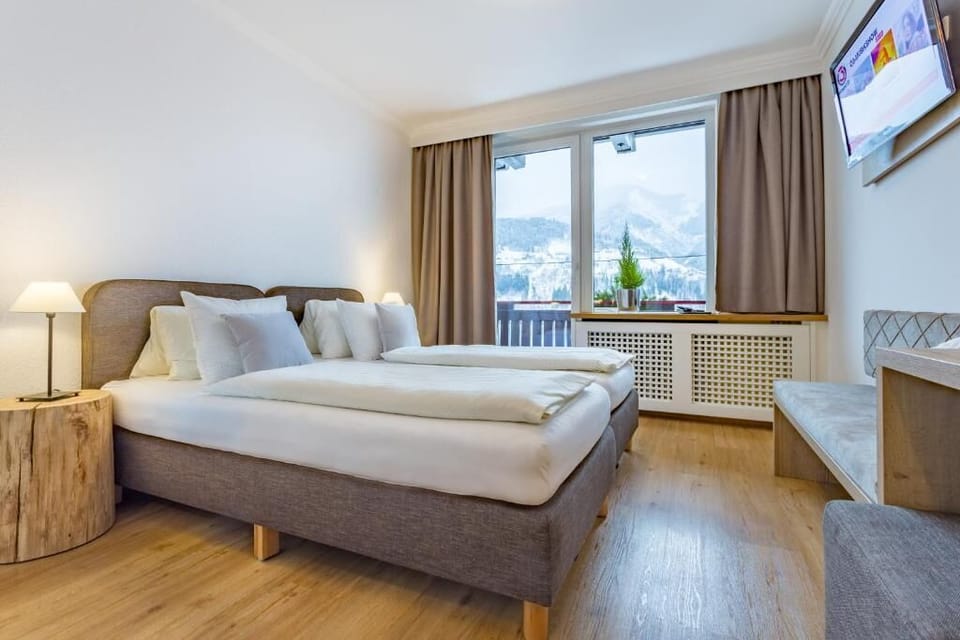 Economy Double Room, Garden View | In-room safe, WiFi (free), bed sheets