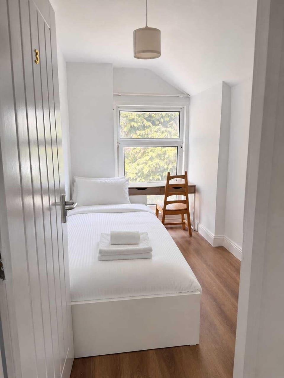 Desk, laptop workspace, free WiFi, bed sheets