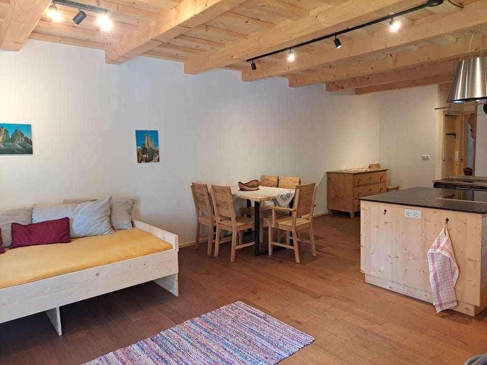 Comfort Apartment, 1 Bedroom, Garden View | Living area | 50-inch flat-screen TV with cable channels