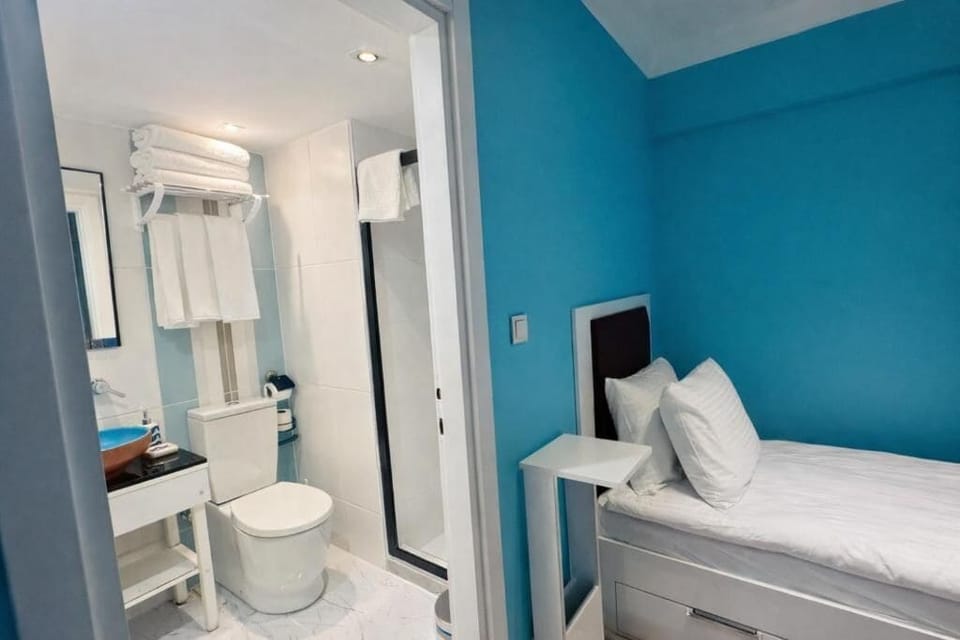 Shower, free toiletries, hair dryer, slippers