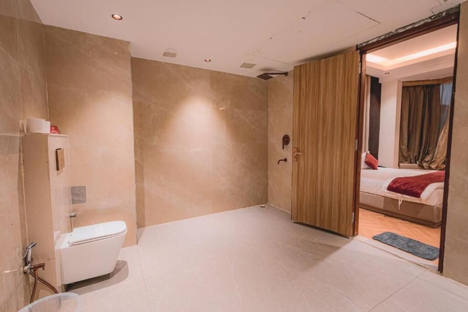Family Room, Garden View | Bathroom | Shower, free toiletries, hair dryer, slippers