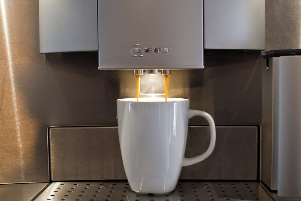 The kitchen has all Neff appliances including induction hob, multifunction oven, dishwasher, fridge freezer, coffee machine and a quooker boiling water tap.