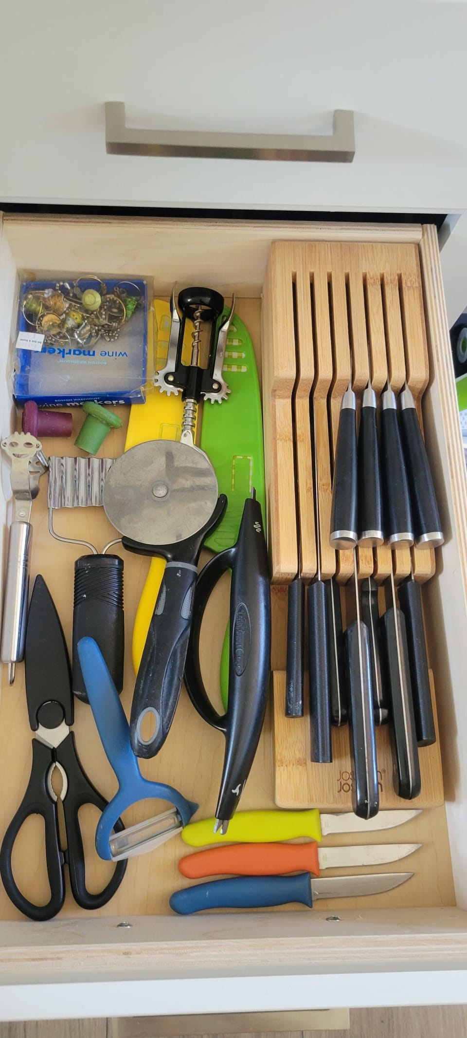 cutlery, wine stoppers, wine opener