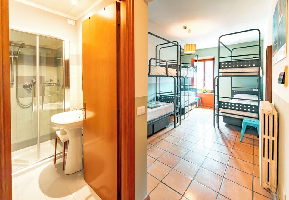 Bed in 6 Bed Female Dorm | Bathroom | Shower, hair dryer, soap, toilet paper