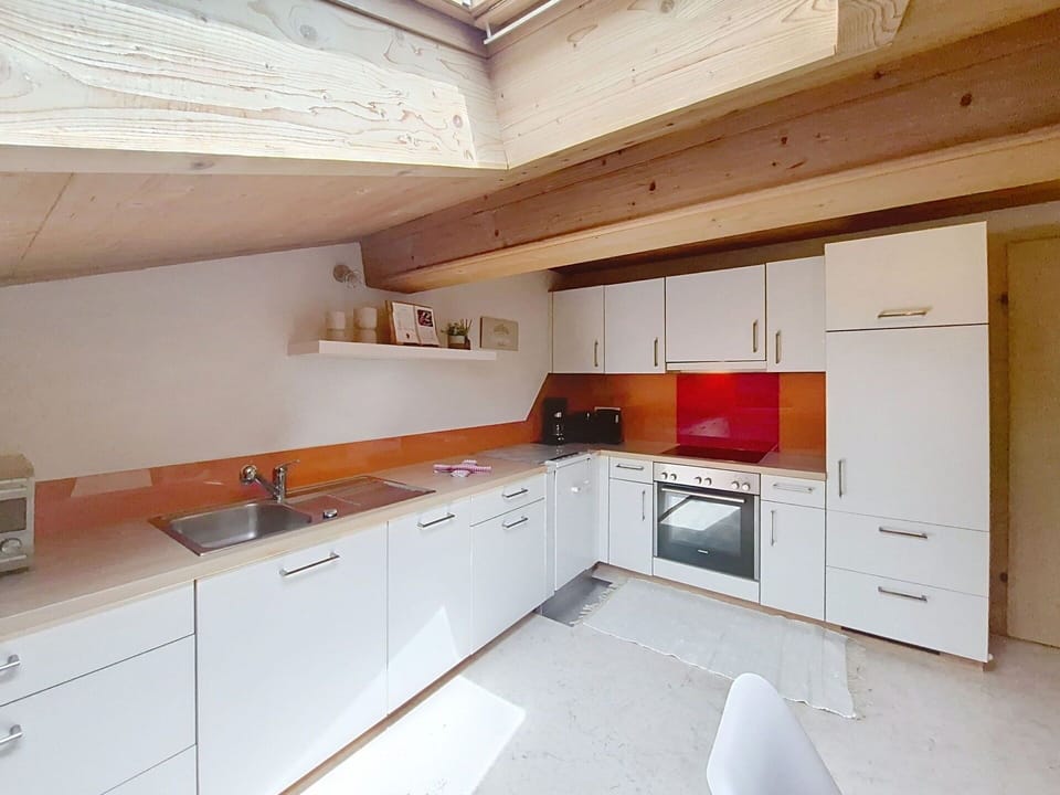 Kitchen, Flooring, Countertop, Wood, Interior Design, Ceiling, Floor, Cabinetry, Kitchen Appliance, Furniture