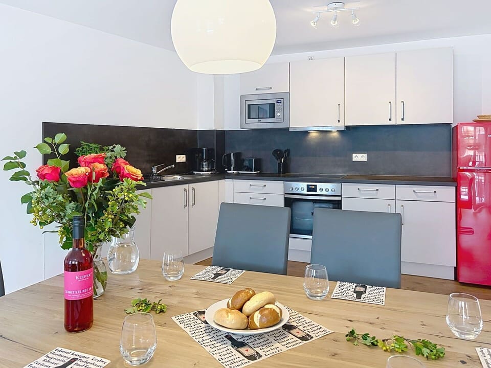 Furniture, Interior Design, Flooring, Floor, Kitchen, Wood, Room, Ceiling, Countertop, Table