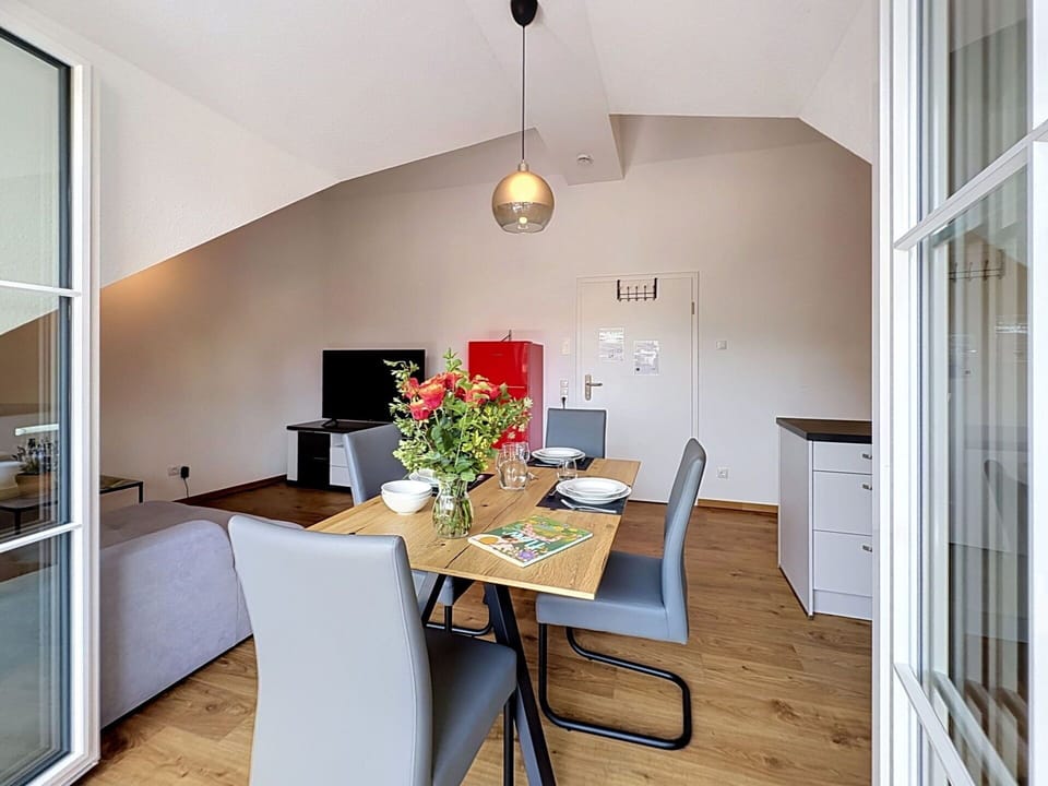 Furniture, Interior Design, Flooring, Floor, Wood, Ceiling, Chair, Room, Kitchen & Dining Room Table, Lighting