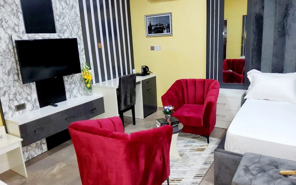 Deluxe Apartment, Balcony, City View | Desk, laptop workspace, blackout drapes, soundproofing