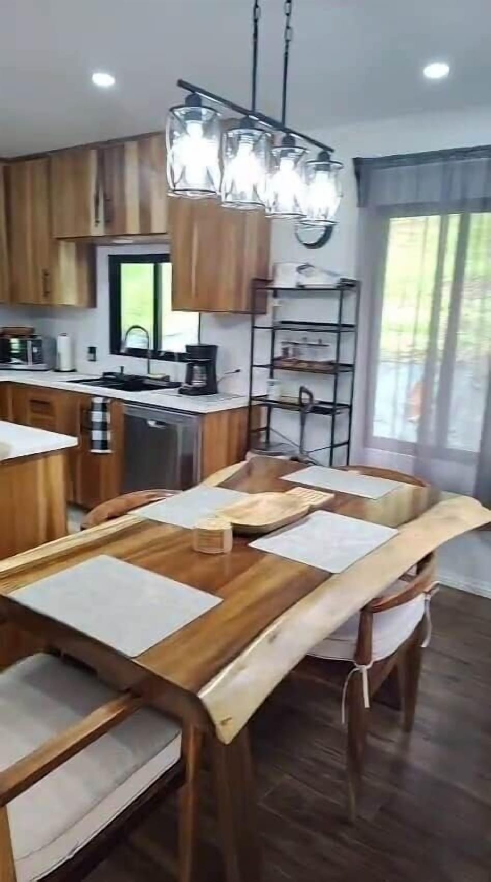 Crafted from natural Costa Rican wood, this is the kind of table where people naturally pull up a chair and stay awhile.