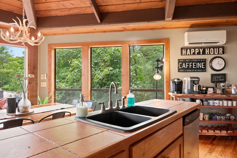 The coffee bar tucked inside the kitchen is full of rustic charm — bathed in natural light and stocked with guest-ready essentials, it is the perfect spot to start every morning at Beech Mountain Place.