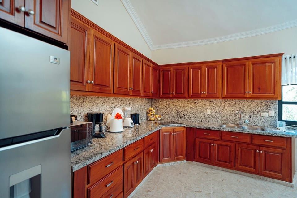 Luxury Villa | Private kitchen | Full-size fridge, microwave, oven, stovetop