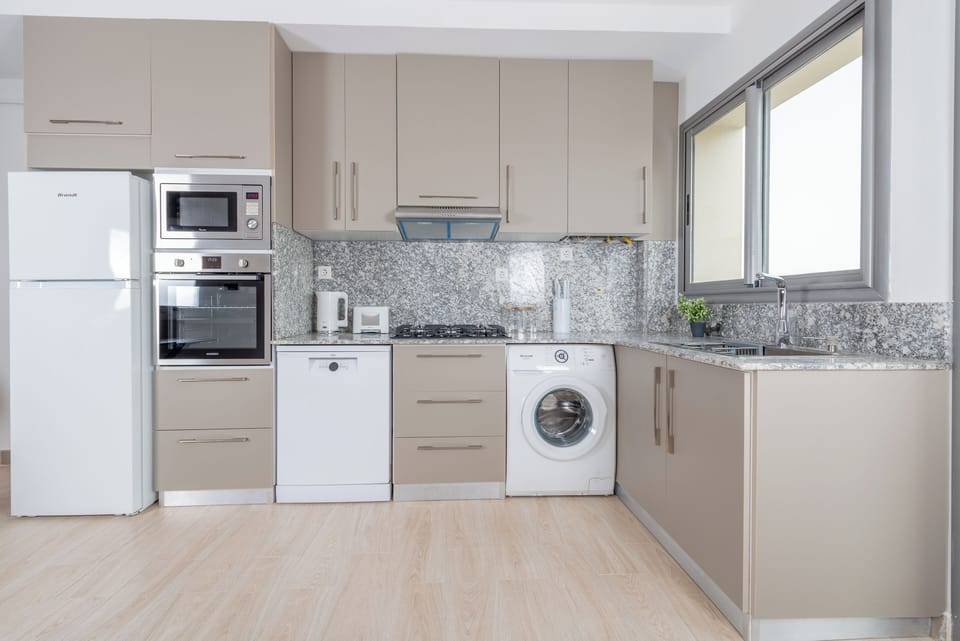 Apartment | Private kitchen | Fridge, stovetop, cookware/dishes/utensils