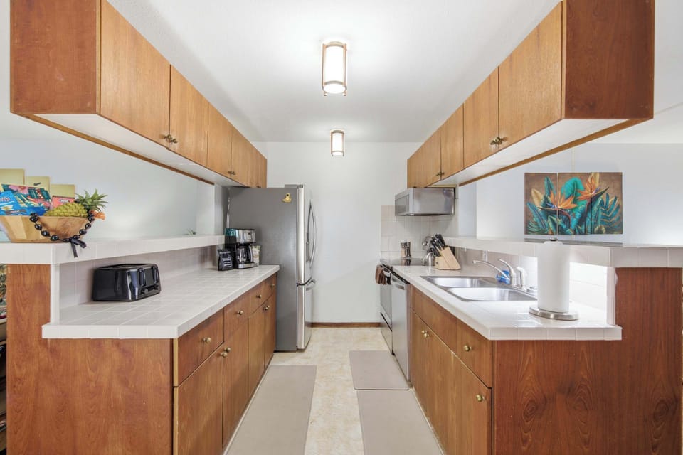 Modern Upgraded Kitchen wiht Stainless appliances for your cooking enjoyment